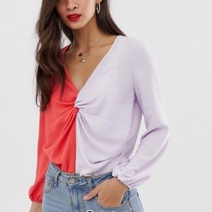 ASOS long sleeve twist front bodysuit in
color block size 10